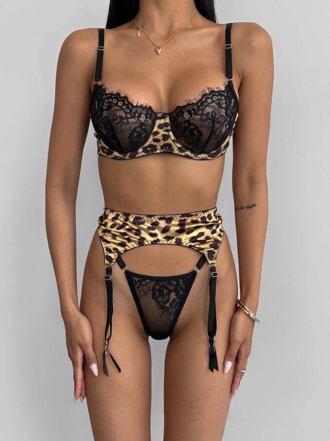 Sexy three-piece lingerie set in lace with stitching and leopard print